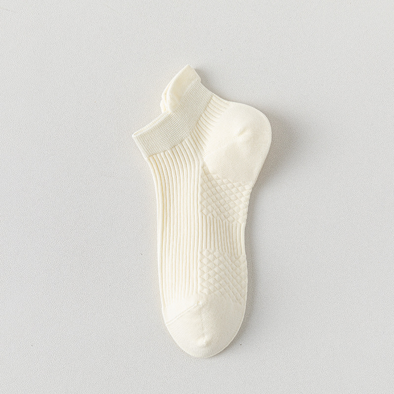 Calcetines de barco para mujeres, calcetines de primavera y verano, calcetines de algodón de color sólido, calcetines de algodón resistentes a las bolas, calcetines de embalaje independientes sin costuras.