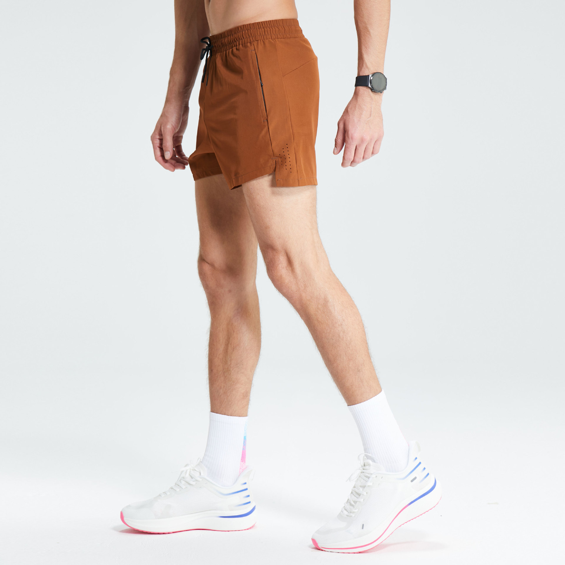 Pantalones cortos deportivos elásticos de cuatro lados tejidos para hombres corriendo maratón pista y campo pantalones de tres puntos malla de secado rápido pantalones cortos de fitness transpirables