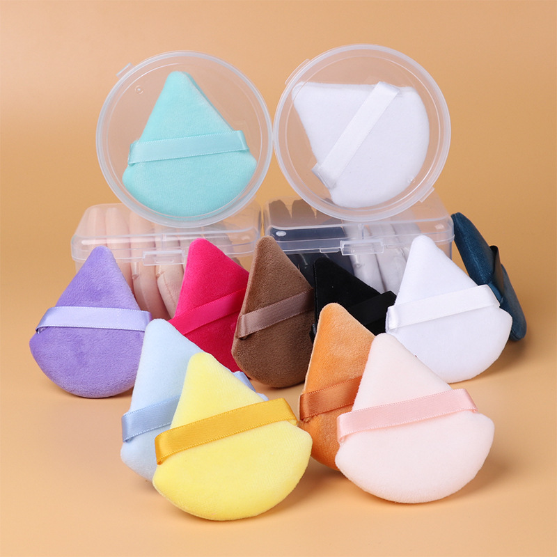Mini-transfronterizas pequeño triángulo soplo maquillaje suelto soplo de maquillaje esponja polvo polvo cojín de aire de dedo al por mayor soplo de flocado