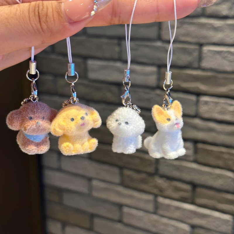 Factory custom cute three-dimensional dog DIY key chain jewelry mini flocking resin small doll mobile phone pendant