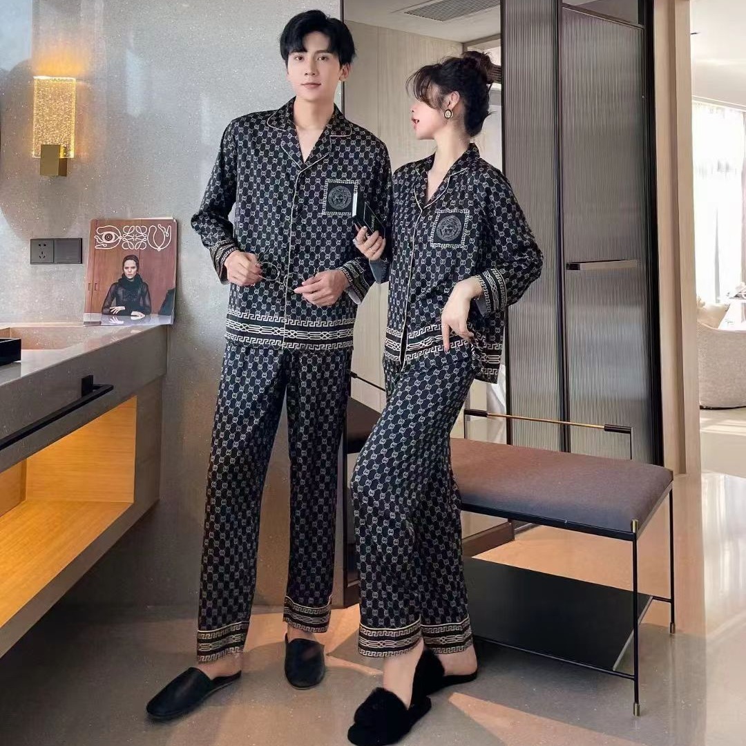2023 primavera y otoño nueva pareja pijamas de seda de hielo de las mujeres de manga larga estilo europeo y americano de los hombres al aire libre desgaste del hogar