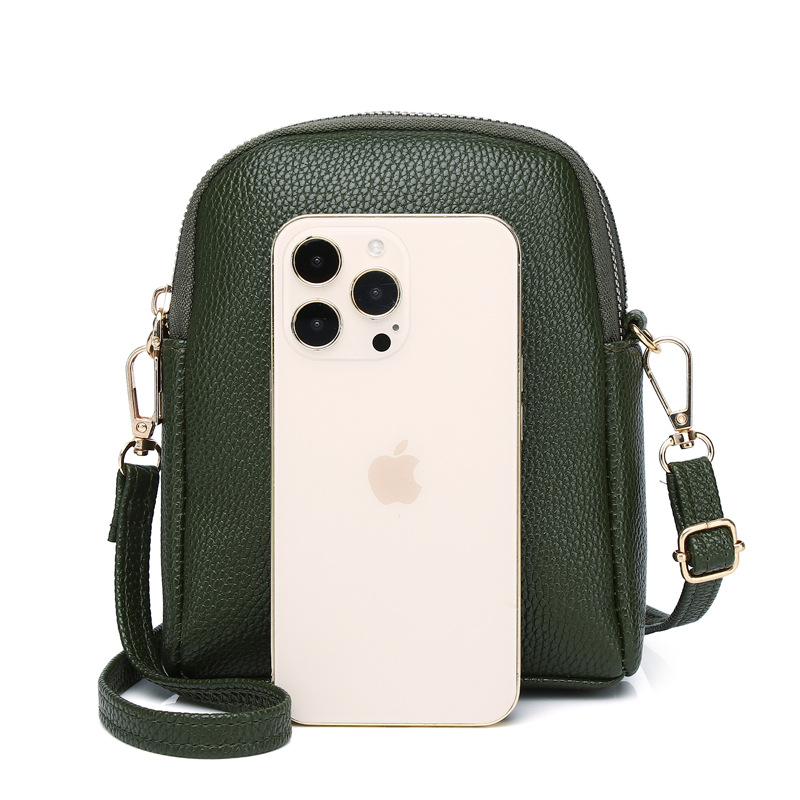 2023 nuevo contraste de color pequeño bolso redondo de lujo ligero estilo Chanel textura lychee patrón de hombro bolsa de mensajero de las mujeres bolsa de teléfono