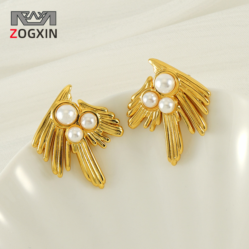 Nuevos pendientes irregulares franceses de alta gama para mujer Pendientes de perlas de golondrina de 18 quilates Pendientes de acero de titanio con personalidad de moda