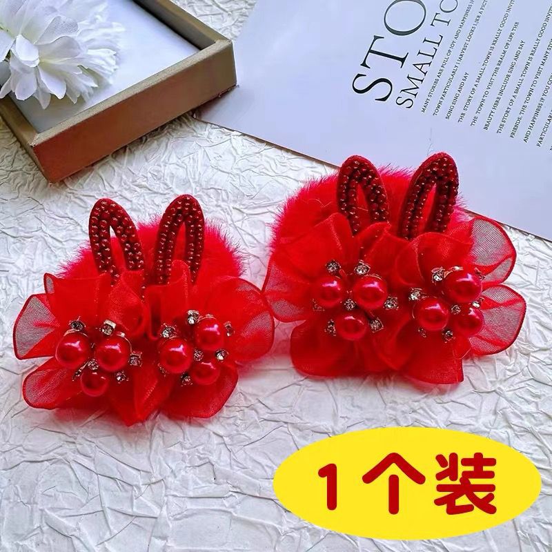 Cuentas de flores de orejas de conejo en un paquete