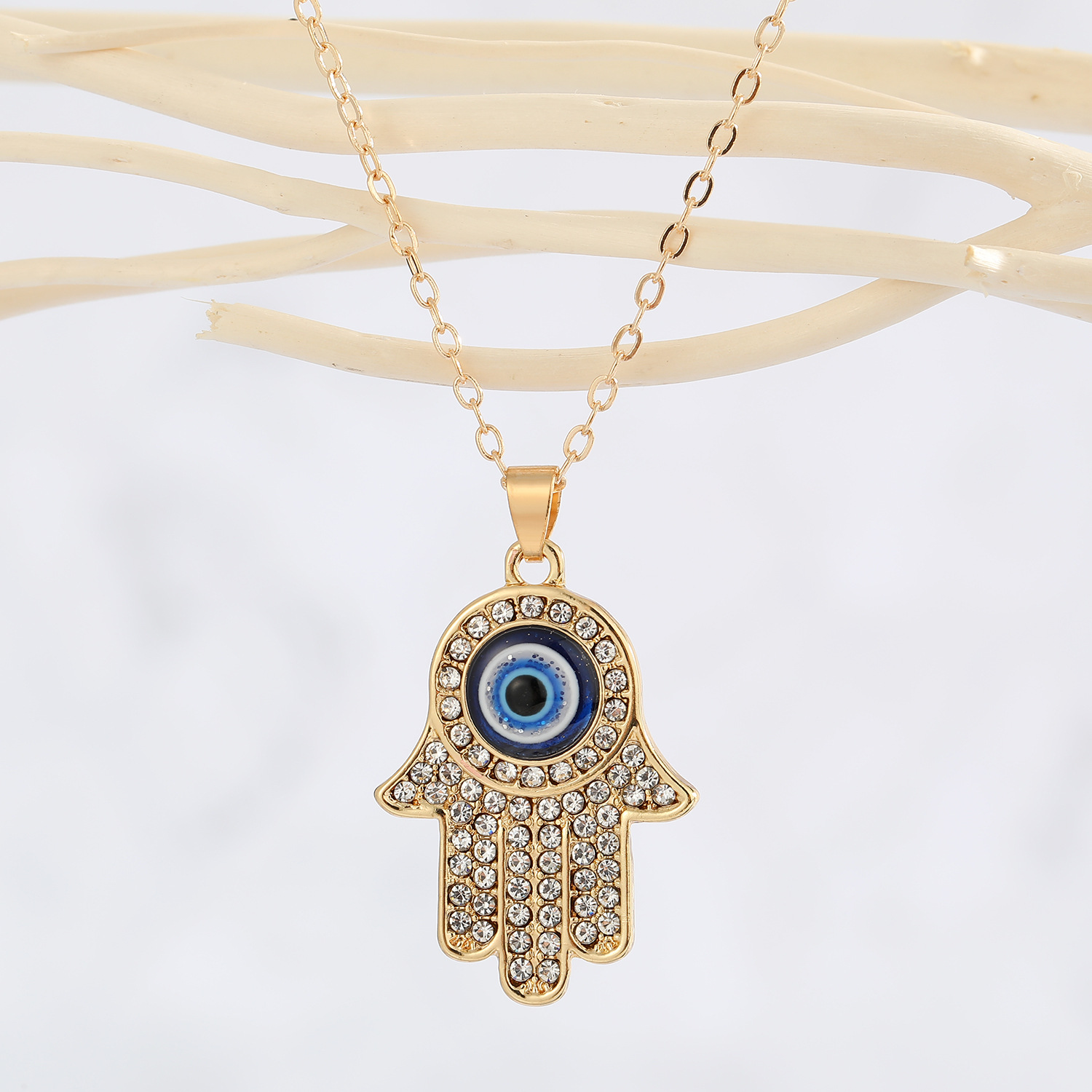 New Turkey Demon Eye Diamond Palm Pendant Necklace Wholesale Nihaojewelry display picture 3