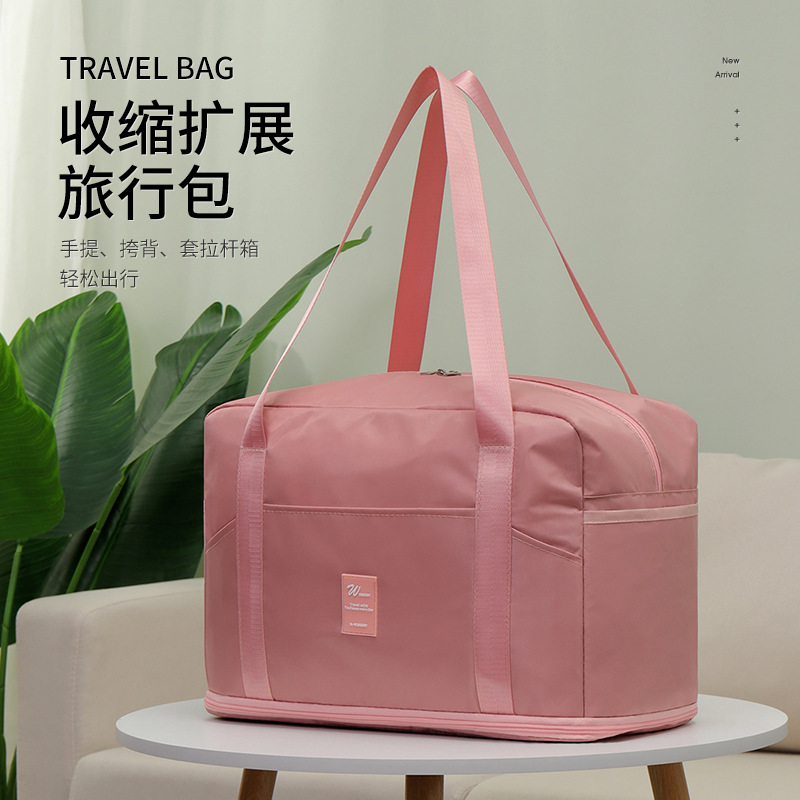Handheld travel bag wet and dry separation