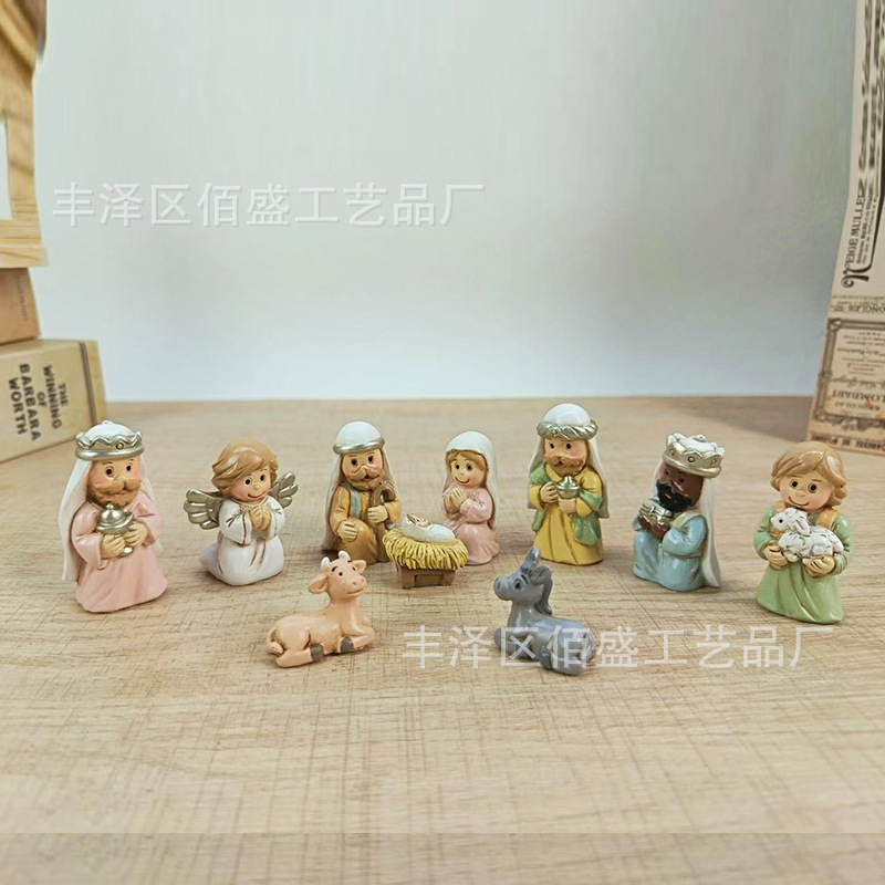 Conjunto transfronterizo de 11 regalos de Navidad dibujos animados Nacimiento del grupo de ornamentación con árboles de jable decoración de resina para el hogar