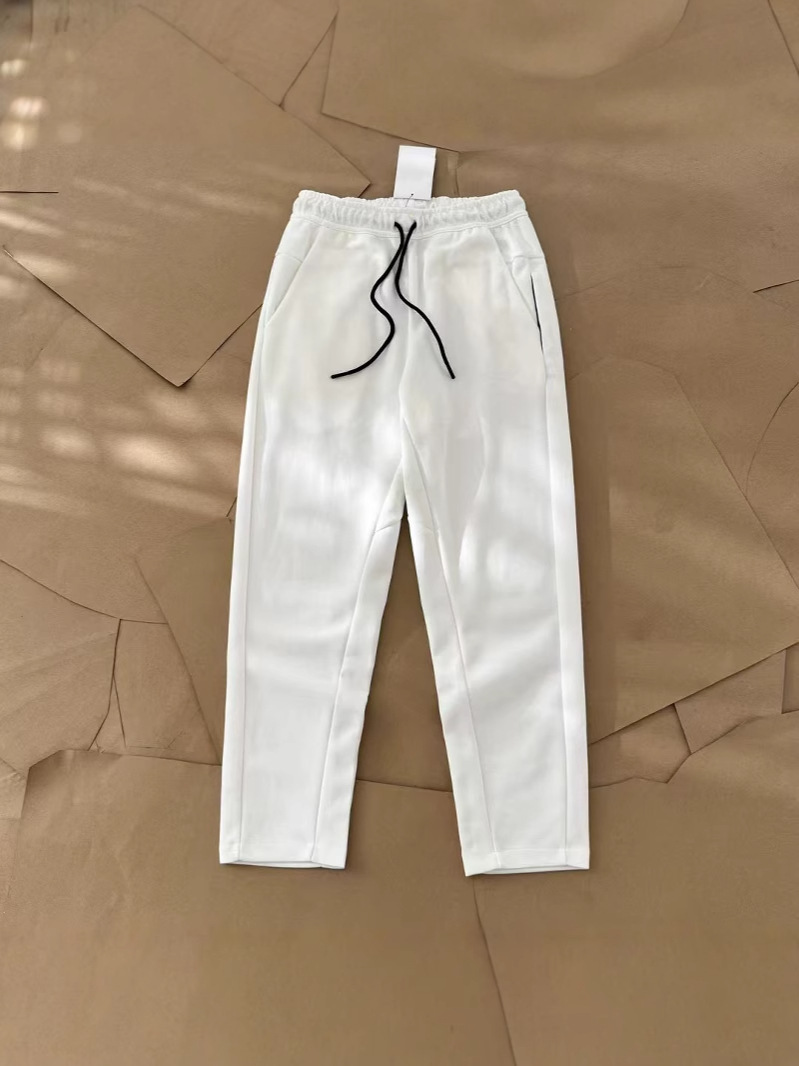 Nuevo hombre deportivo ocio al aire libre versátil punto suelto pantalones largos de piernas largas pantalones 211