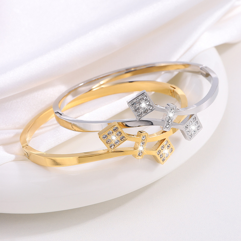 Brazalete de acero de titanio Waffle Personalidad no se desvanece Brazalete de diamantes de mujer abertura de pareja de alto nivel Brazalete de acero inoxidable