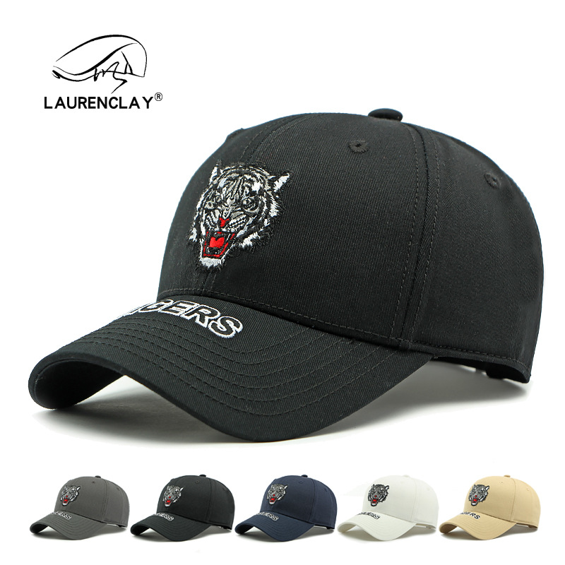 China personalidad de estilo tigre bordado sombrero de béisbol duro superior hombre sombrero de sombrero de sol al aire libre sombrero de lengua de pato universal sombrero de mujer