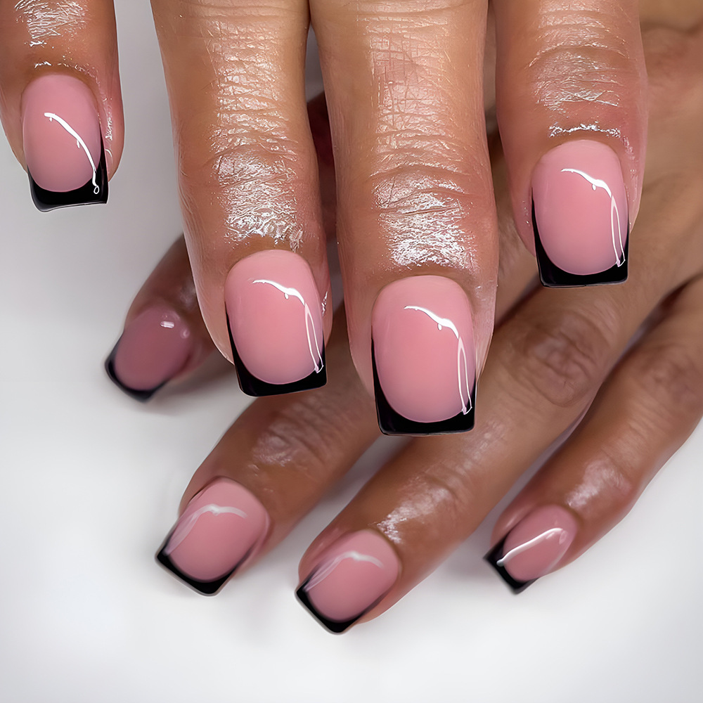 Uñas postizas cortas de punta plana, set de 24 piezas, serie rosa con bordes negros, pegatinas de uñas estilo francés de gran venta para ventas transfronterizas.