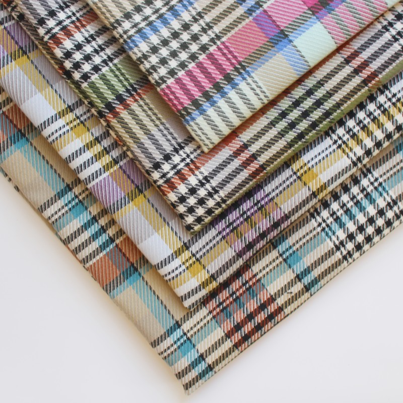 2024色织格子布料涤纶弹力斜纹弹力格纹布匹批发服装女装提花面料