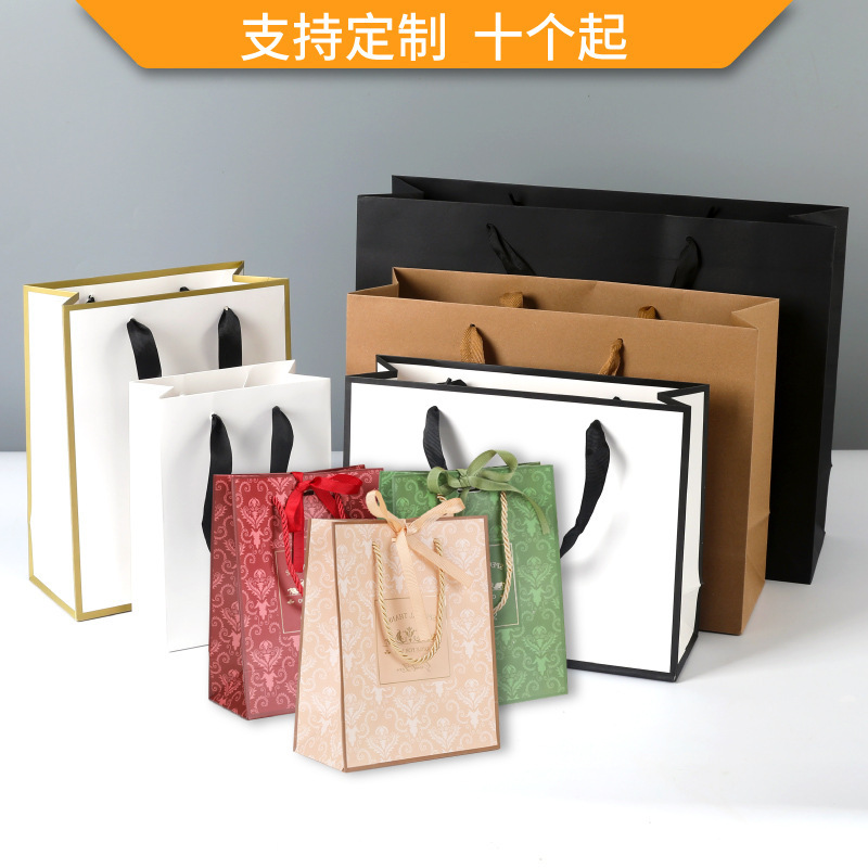Handbag white cardboard bag packaging gift bag gift clothing store clothes women's logo printing a large number of in stock Handbag white cardboard bag packaging gift bag gift clothing store clothes women's logo printing a large number of in stock