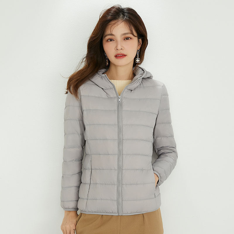 90 chaqueta de plumón de mujer con capuchón ligero corto de tamaño grande ligero estilo extranjero chaqueta de plumón blanco chaqueta Pinghu al por mayor