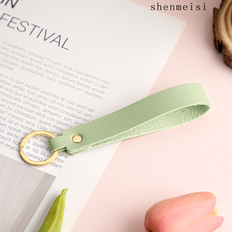 Keychain de cuero pu transfronterizo estilo simple de mano hebilla de cuero logotipo imprimible colgante de cuero llavero para hombres y mujeres