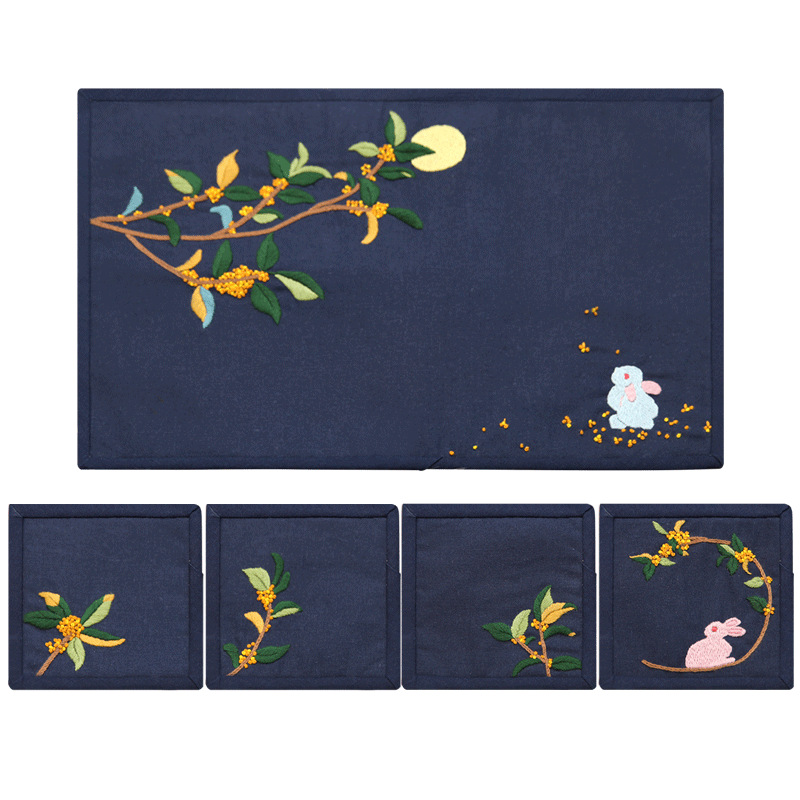 Bordado DIY paquete de material estera de té de cuatro piezas hecho a mano Lu bordado conejo Flor de melocotón bolsa de costura sala de estar estera de té montaña