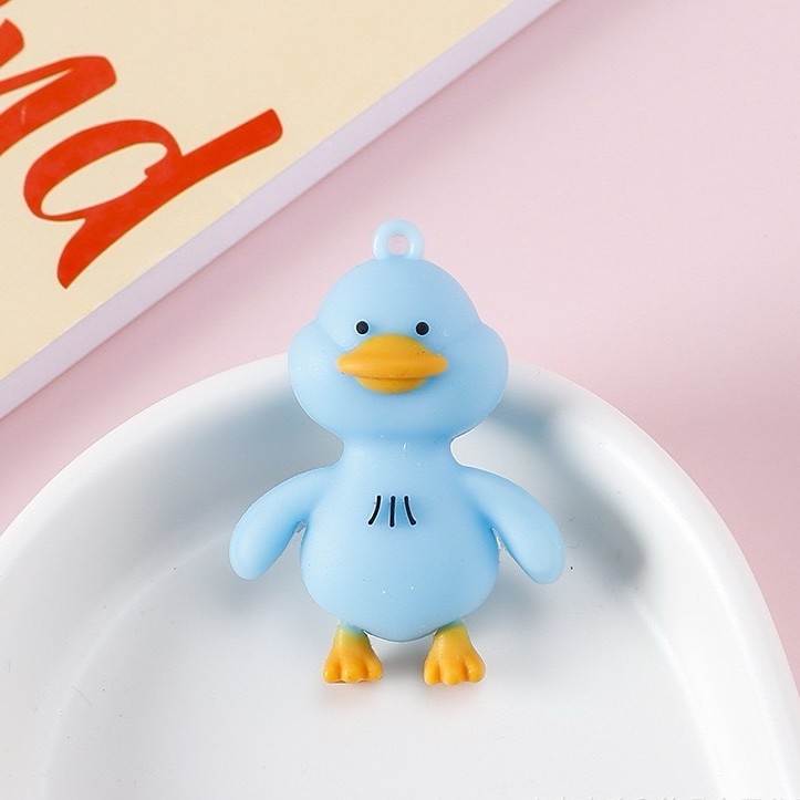Creativo de dibujos animados pegamento suave pato amarillo colgante llavero adorable reabastecimiento de pato colgante bolsos accesorios llavero al por mayor