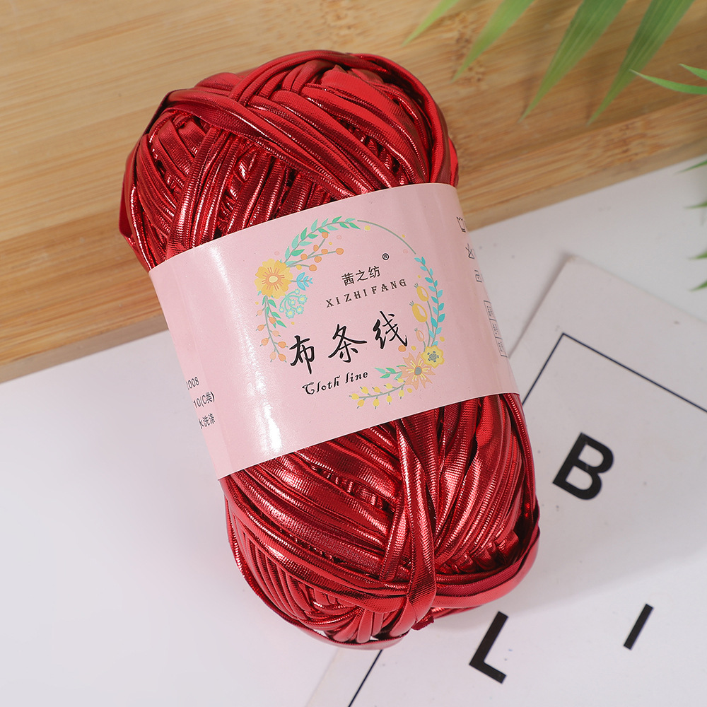 Línea textil Qian Zhi hilo de color mágico tejido a mano hilo de fantasía de color bricolaje en stock fábrica al por mayor