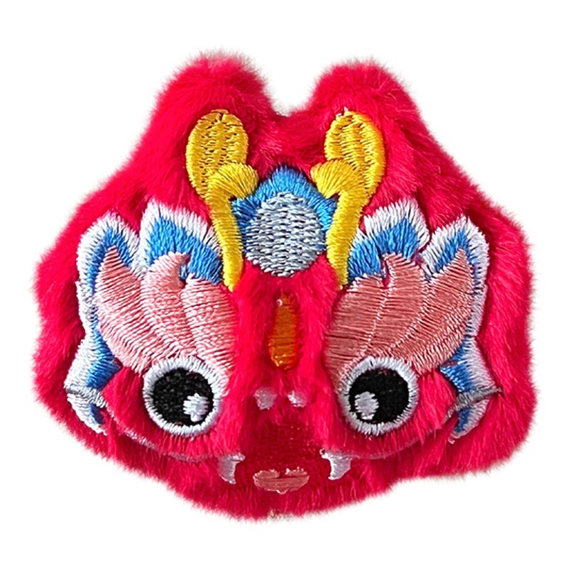 Año Nuevo muñeca de peluche broche dragón Año Nacional moda muñeca joyería pin guantes bufanda accesorios decorativos al por mayor