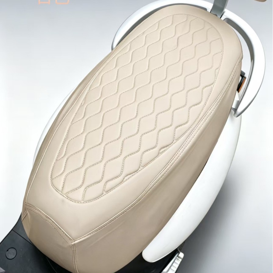 cubierta de asiento de motocicleta de automóvil eléctrico cubierta de cojín impermeable de cuero cubierta de cojín de pedal resistente al quemado aislamiento de acero doble aguja línea de presión