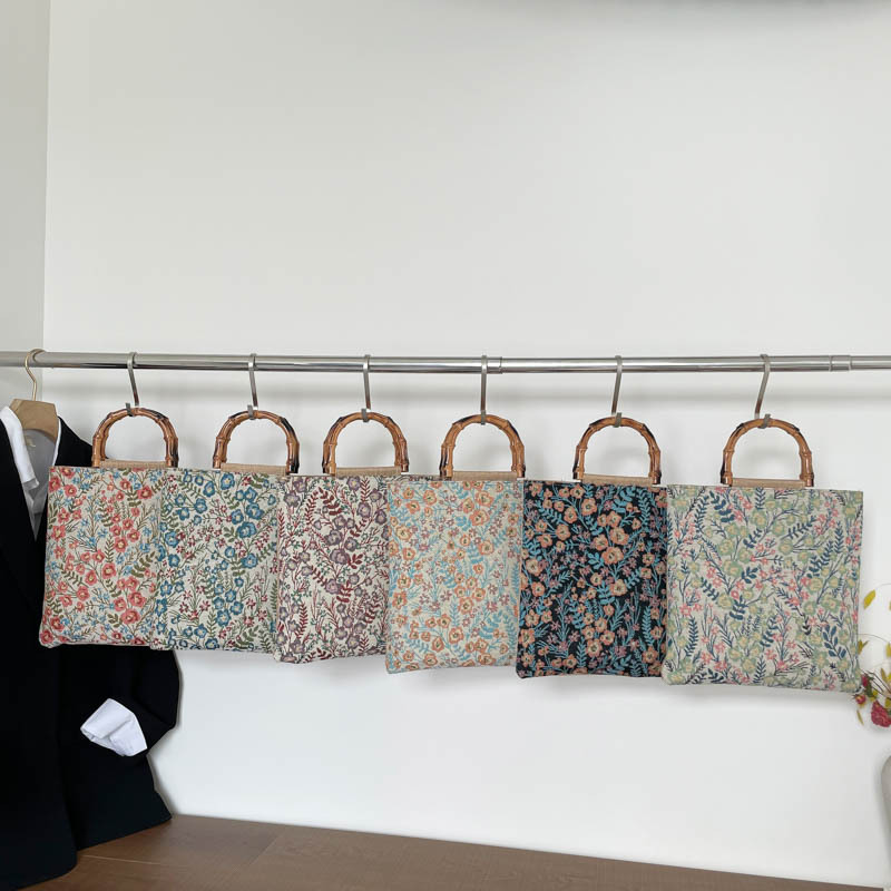 2026 nueva bolsa de mano de gran capacidad de mujer de algodón coreano de moda universal bolsa de viaje bolsa de trabajo