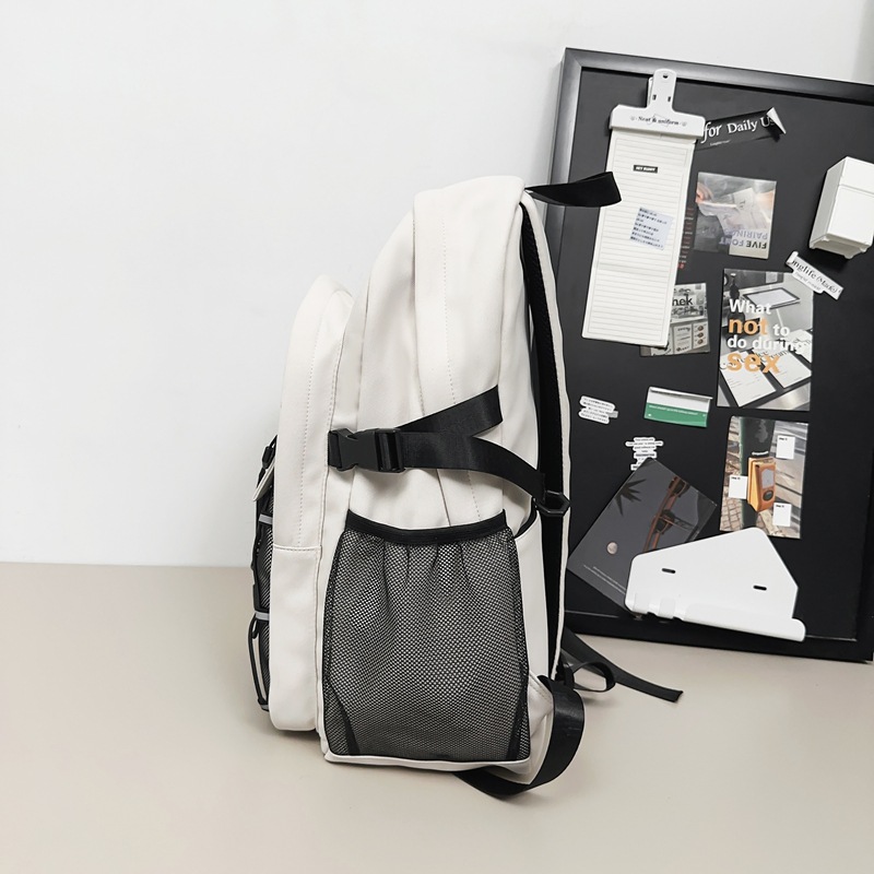 Mochila escolar resistente al desgaste para estudiantes universitarios en clase, mochila simple y versátil para estudiantes de secundaria, mochila de viaje de gran capacidad al por mayor