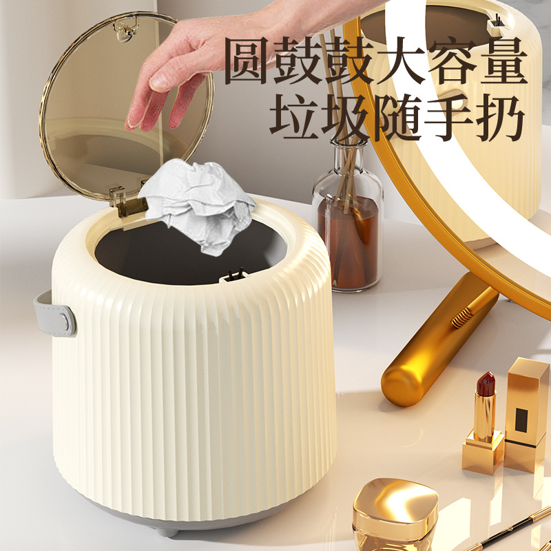 A luxury covered desktop trash can with a handle, suitable for office, bedroom, living room, car, study room, and high-end appearance