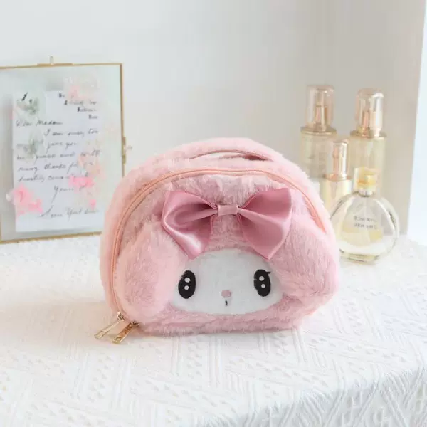Handheld cosmetic bag
