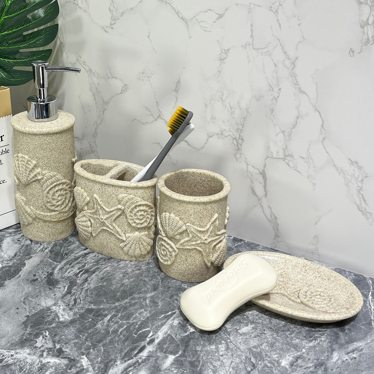 Baños de hotel de cuatro piezas de baño de arenisca imitación de diseño de baño de resina taza de jabón botella de desinfectante de manos