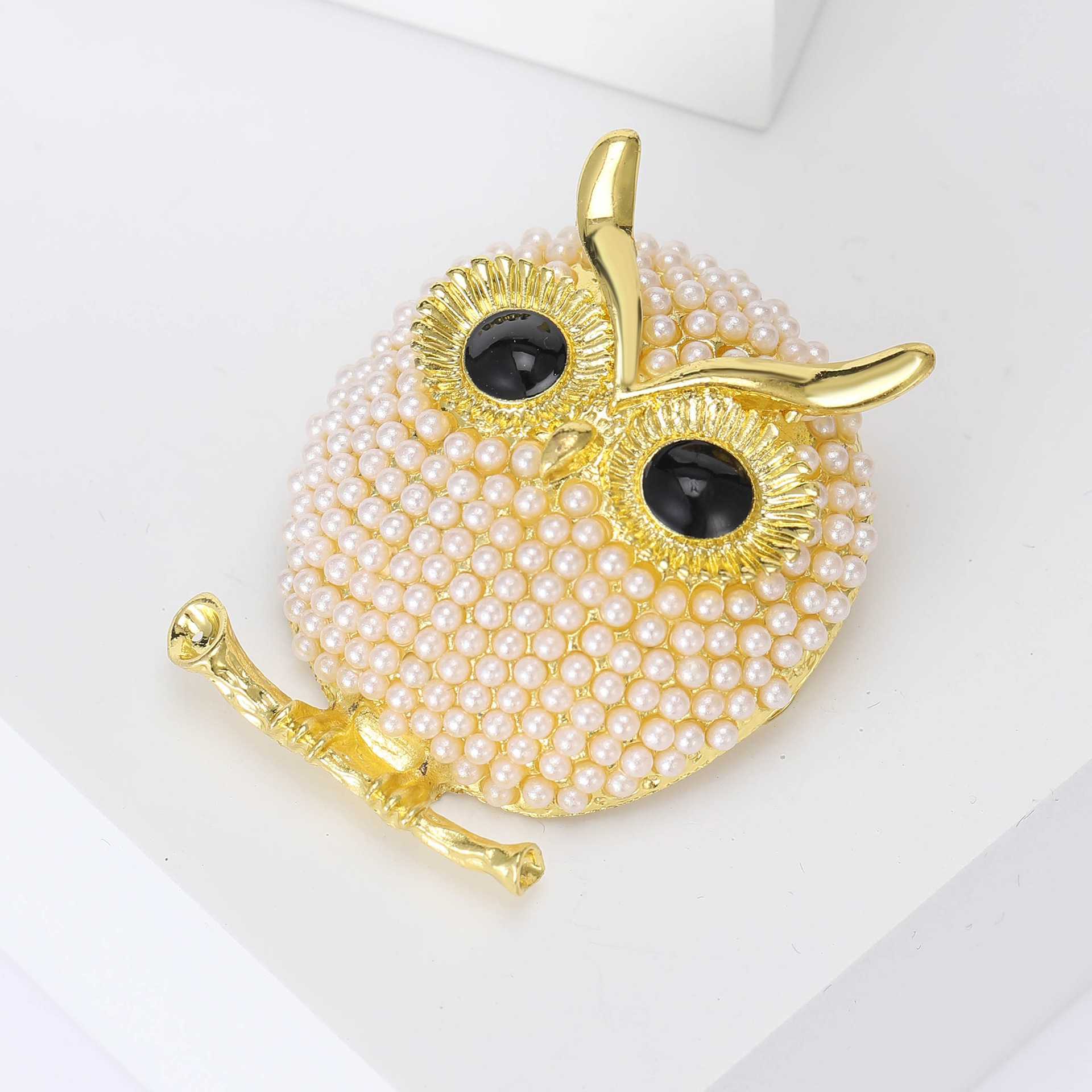 Nuevo estilo coreano caliente joyería búho lindo dibujos animados ramillete aleación electrochapado perla ramillete ventas directas de la fábrica