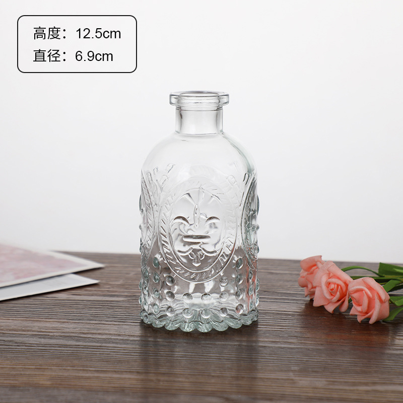 Estilo Europeo Retro Luz de lujo de cristal alivio pequeño florero de agua transparente florero decoración del hogar mini florero