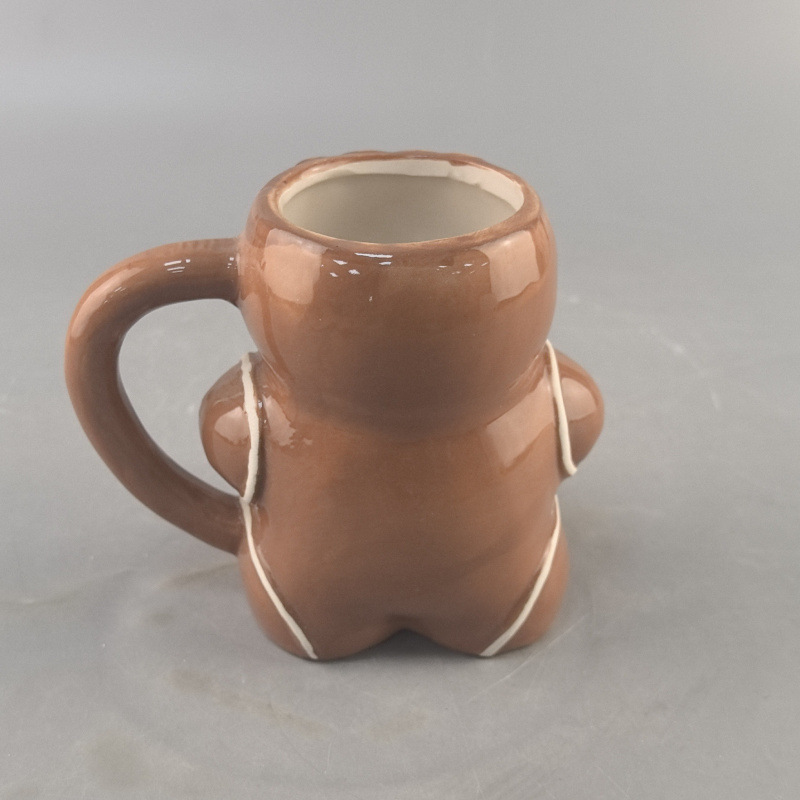Navidad spot pan de jengibre hombre taza de cerámica decoración en relieve creativa taza de cerámica de dibujos animados taza de jengibre hombre en relieve taza