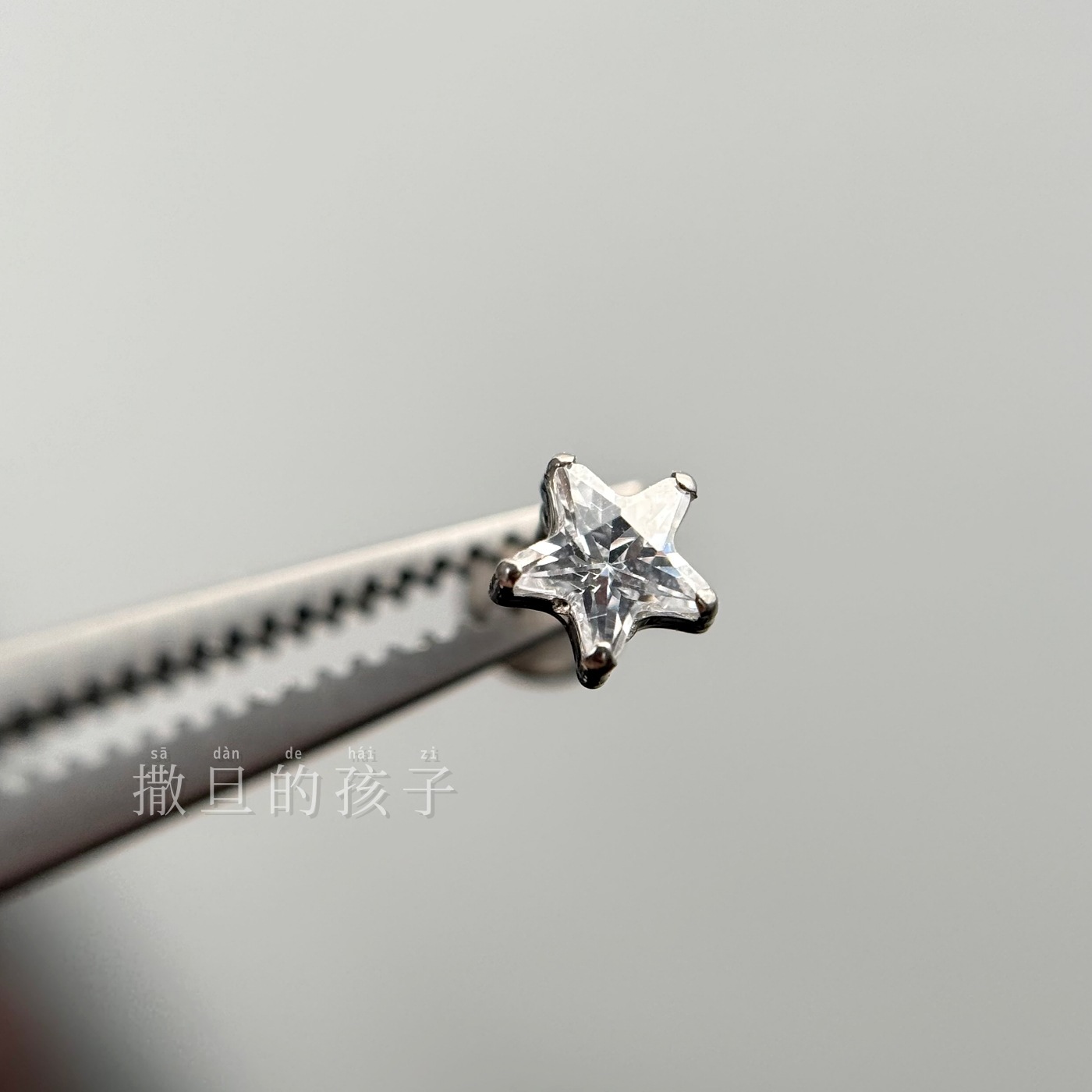 Silver pointed spike labret stud material detail