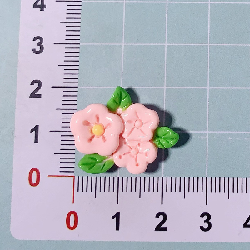 Simulación de dibujos animados flores dulces DIY adornos refrigeradores pegamento de crema accesorios accesorios de resina accesorios accesorios materiales de joyería al por mayor