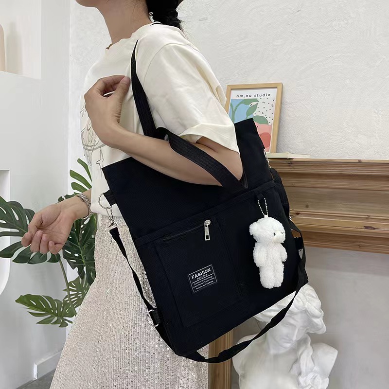 Bolso de lona de un solo hombro coreano para mujer multiusos ins Mochila de almacenamiento para estudiantes universitarios de moda