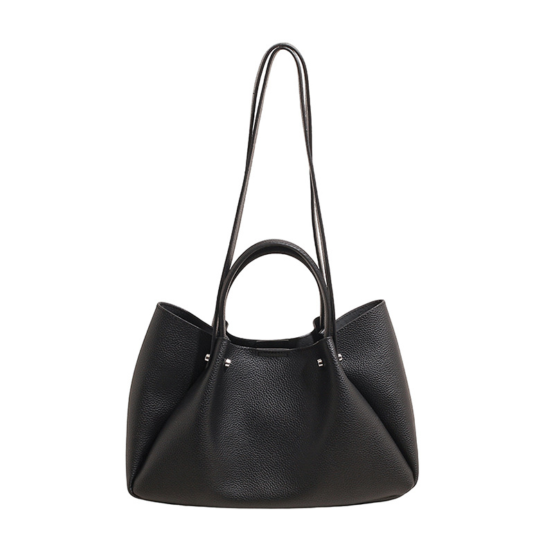 Bolso coreano nicho bolso de brazo bolso de mujer 2026 nueva gran capacidad de transporte universal bolso de hombro