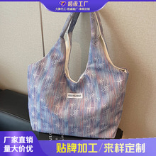 外贸休闲大容量布包包女2026新款轻便百搭通勤单肩包大学生托特包