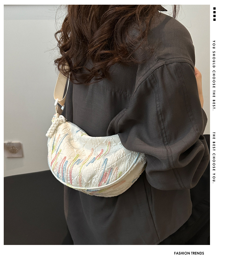 The new 2024 fashionable canvas versatile dumpling bag, a simple and stylish single-shoulder bag for commuting ladies with a high level of appearance undefined