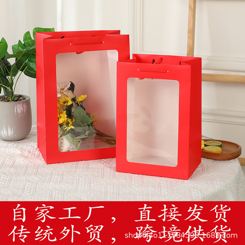 工厂直销现货圣诞节大红色礼品袋透明展示窗开窗手提袋玩偶展示袋