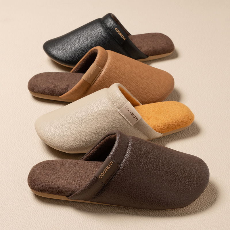 Silent cotton slippers for men, featuring a luxurious leather-like texture, perfect for indoor use in bedrooms during autumn and winter. They have a soft, non-slip sole