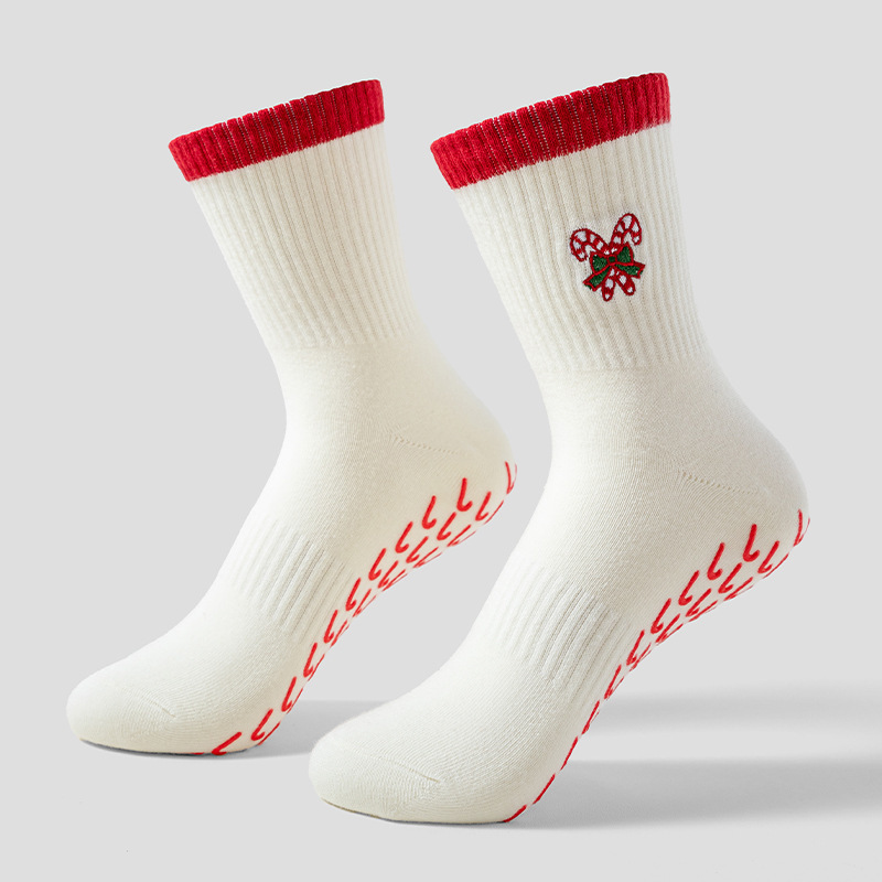 Christmas-themed limited-edition socks, autumn/winter yoga socks with anti-slip features, cane-tip design, embroidered with red trim, perfect for parties, fitness, and sports