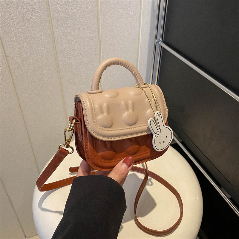 Bolsos para niños, bolsos de mochila encantadores, bolsos de moda de dibujos animados, bolsos de montar de mano, bolsos de cambio para bebés de niñas