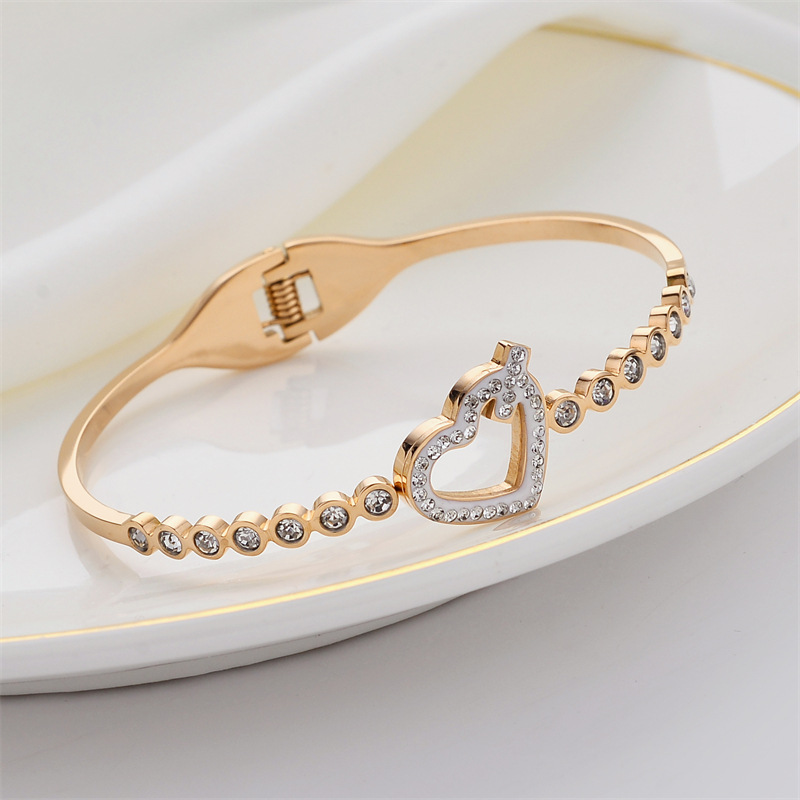 Pulsera de titanio y acero para mujer, diseño moderno y sencillo, pulsera de lujo que no se desvanece, venta al por mayor en stock.