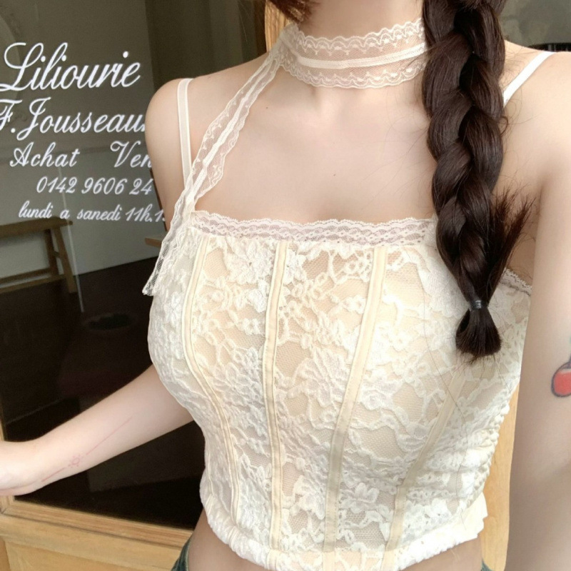 Delicate lace halter top with a slim waist, fitted boning, and beautiful back; a new style featuring a pure and alluring strappy design.