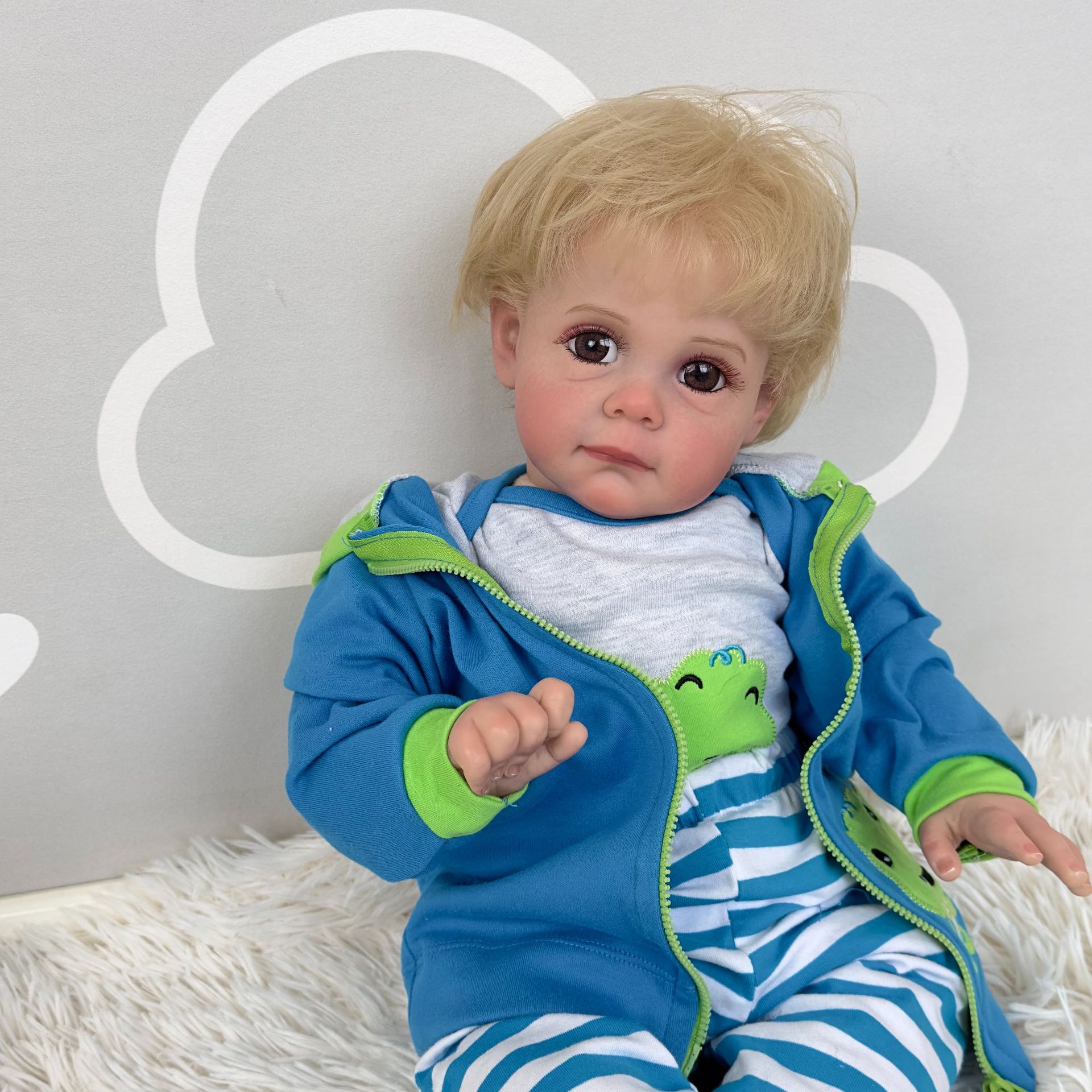 60cm simulación muñeca renacer niño Maddie transfronterizo e-commerce suministro entrega de una sola pieza