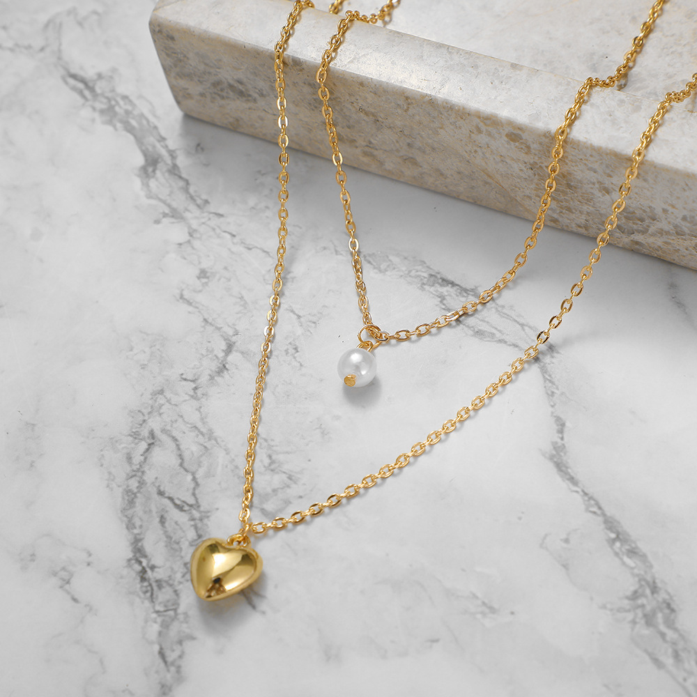 Collier cœur en perles multicouches, style européen et américain, collection 2021 : bijoux féminins simples, rétro et créatifs, inspirés des styles européen et américain._voghion.com