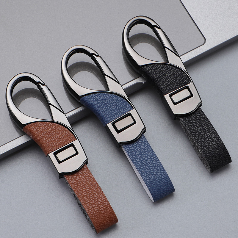 2024 llavero de coche transfronterizo explosivo, botón a presión de cuero de alta gama, colgante de llavero de negocios simple y personalizado