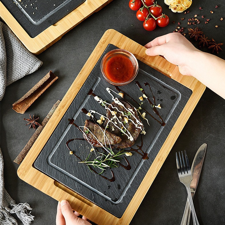 Fábrica de tamaño directo estilo personalizado tablero de bambú tablero de roca plato de comida occidental madera tablero negro plato de horneado