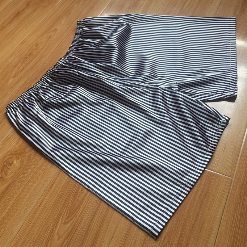 Wholesale big shorts men's shorts pajama pants summer Tianqi artificial silk beach pants Ice Silk home pants five points can be worn outside