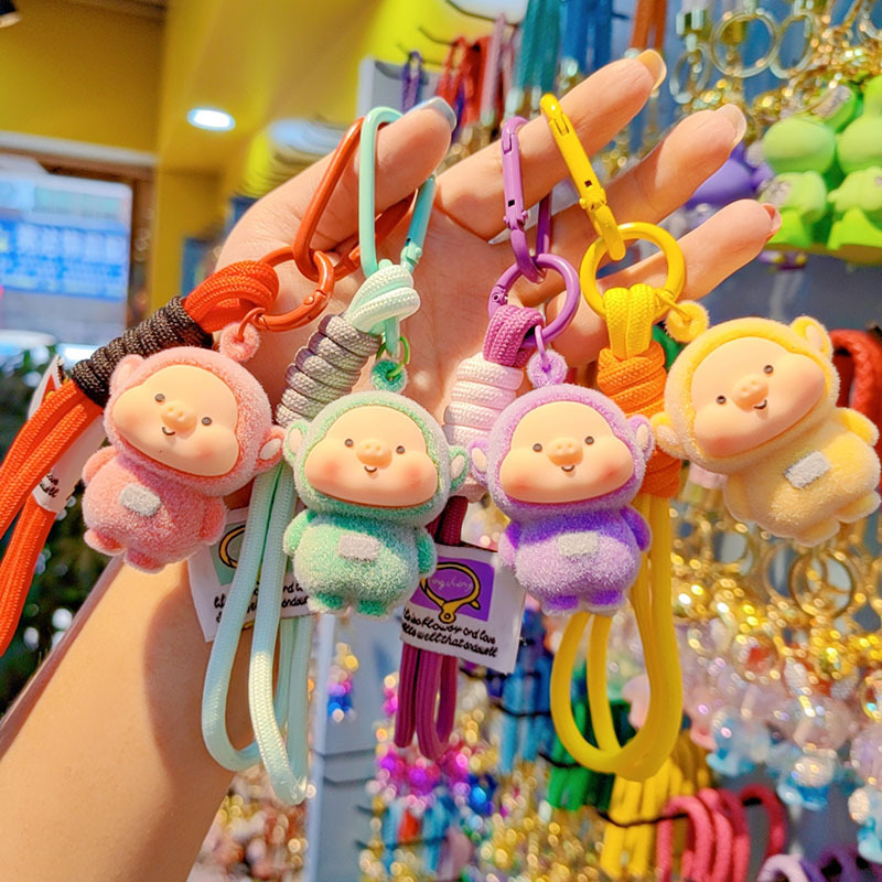 Antena de flojo de dibujos animados pareja llavero de coche creativo colgante de llave de bolsos de mujer colgante colgante al por mayor